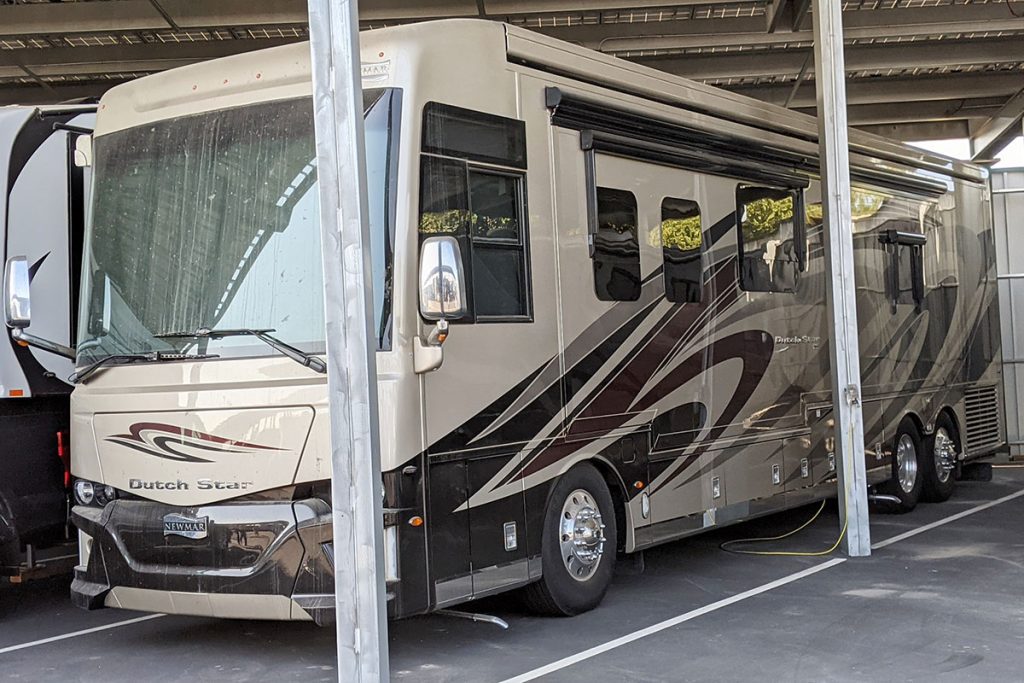 Canopy-covered RV storage.
